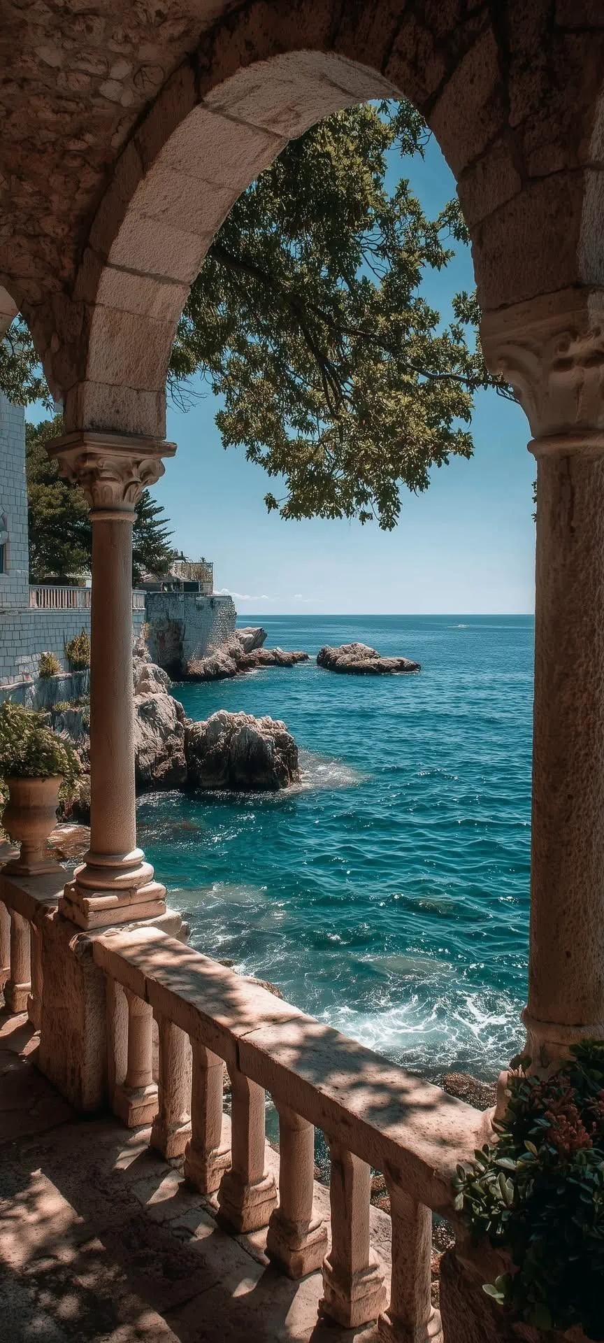 Key visual — stone arches over a turquoise coastline